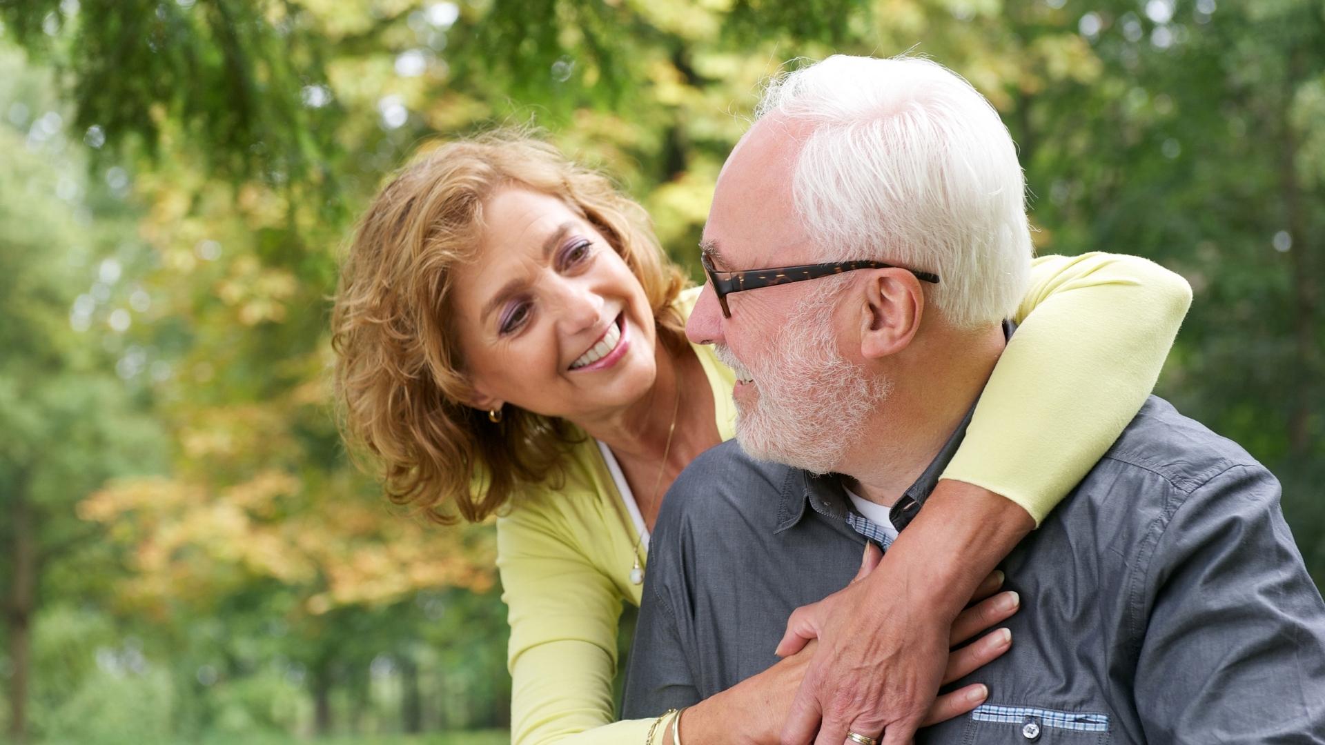 Woman drinking tea and relaxing because she didn't have to work extra hours to pay her bills.