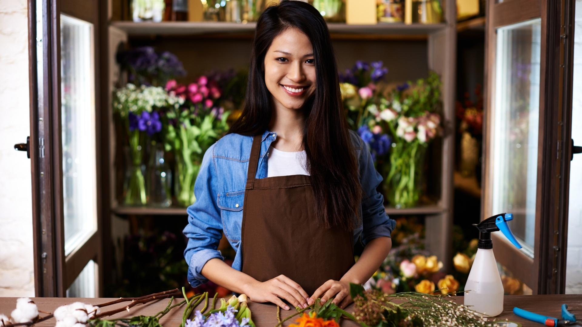 Young woman who has the financial freedom to start her own flower shop.